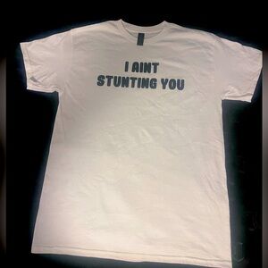 Women/Men. This comfy T-shirt can be worn & paired in so many fashionable ways.